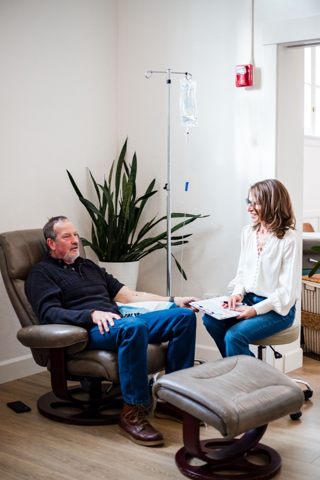 Dr. Franks reviewing a treatment plan with a male patient