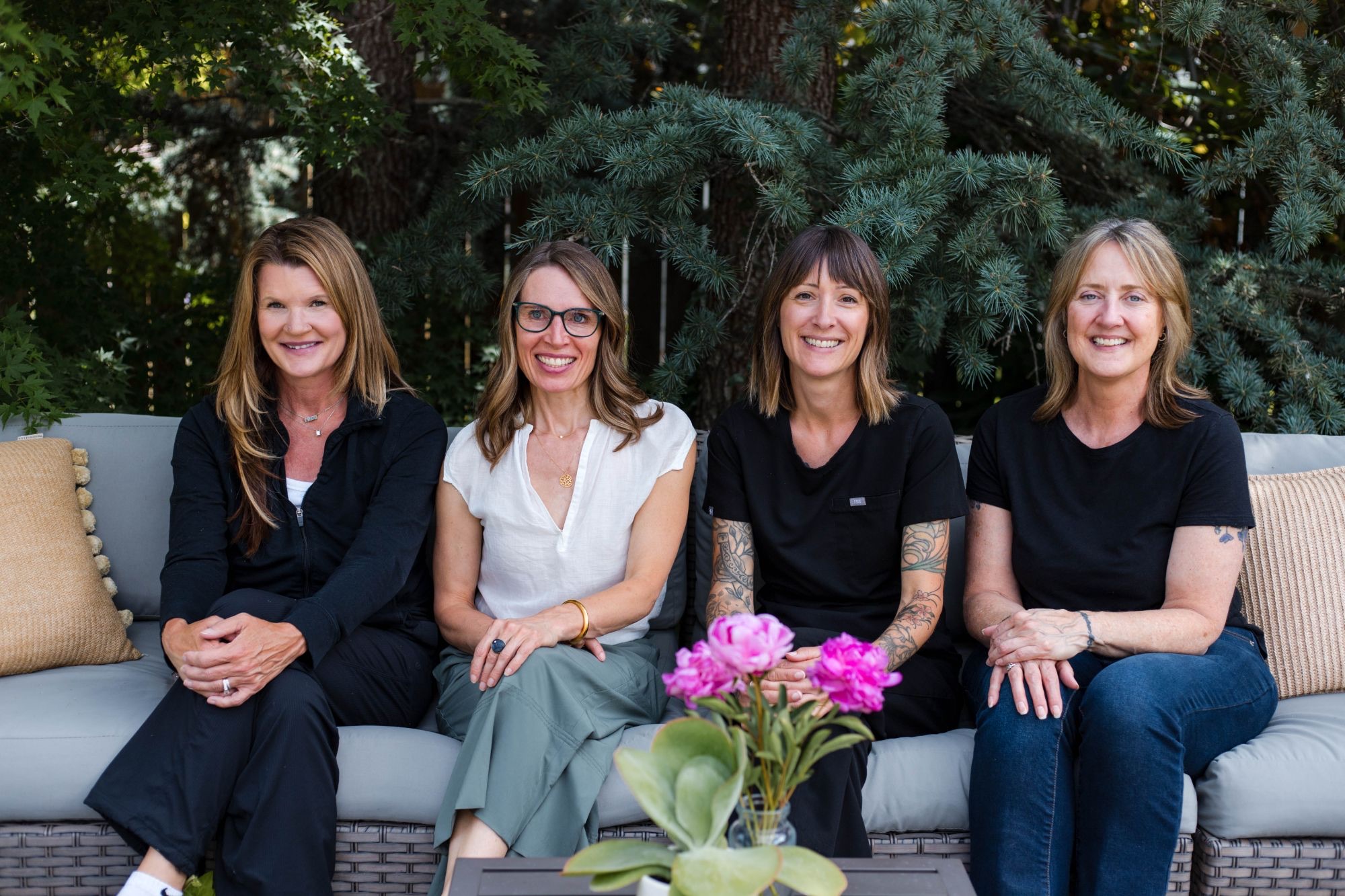 The Swiftwater Medical team sitting together outdoors
